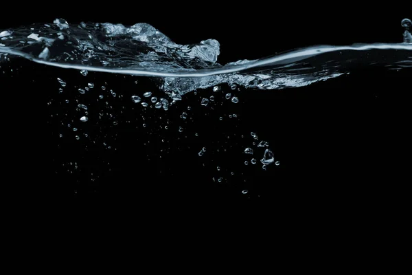 Superficie de agua sobre un negro —  Fotos de Stock