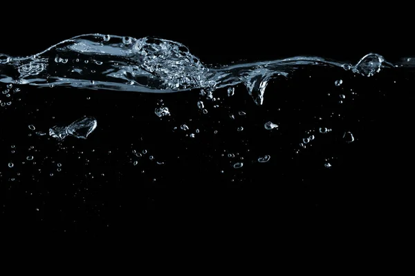 Superficie de agua sobre un negro — Foto de Stock