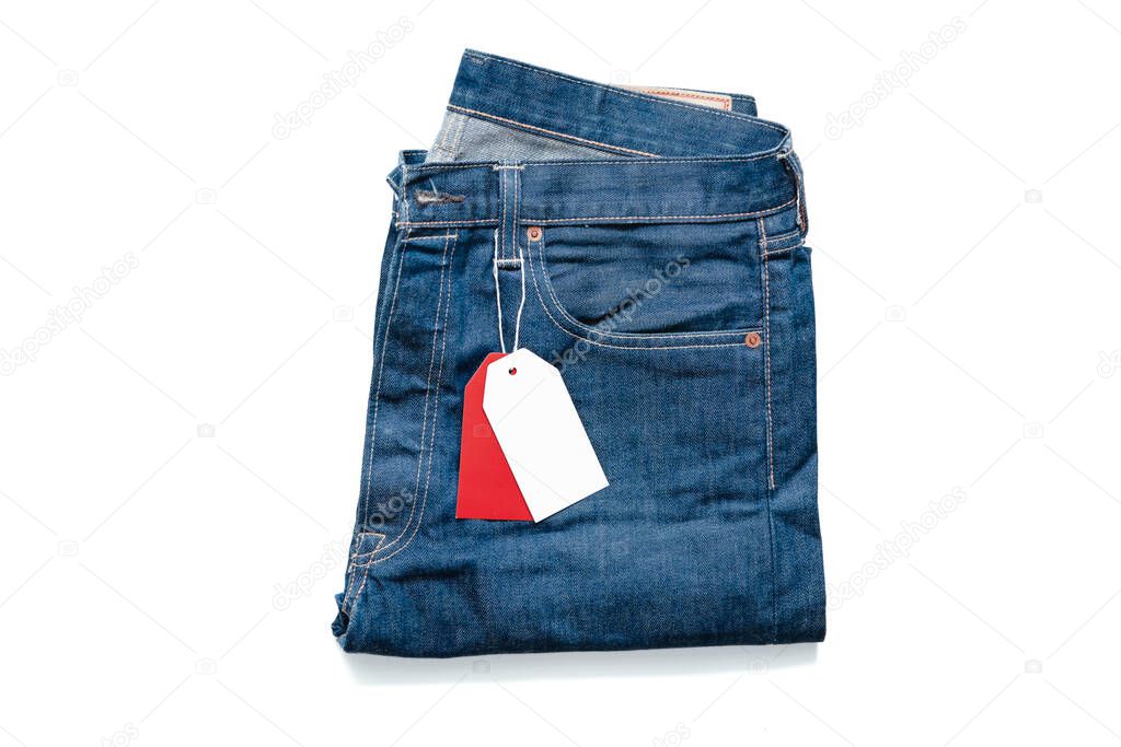 White and Red Blank Tag Price On Jeans. Copy Space. Empty Space. Promotion and Advertising