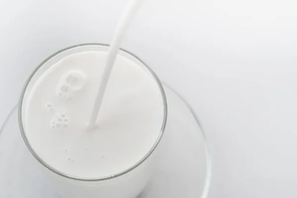 Pouring Milk Glass — Stock Photo, Image