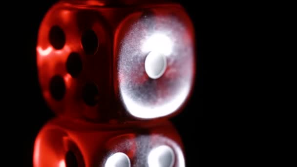 Game of Reflections Red dice rotating on black background — Stock Video