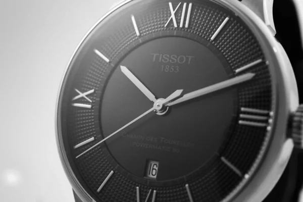 Le Locle, Швейцарія 15.01.2020 - Tissot man watch less steel case, black clock face dial, ather strap, swiss quartz techantic watch isolated, swiss made production — стокове фото