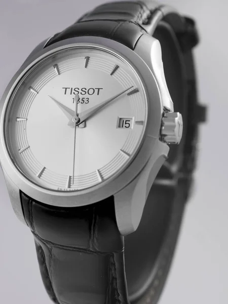 Le Locle, Швейцарія 15.01.2020 - Tissot man watch less steel case, white clock face dial, ather strap, swiss quartz techantic watch isolated, swiss made production — стокове фото