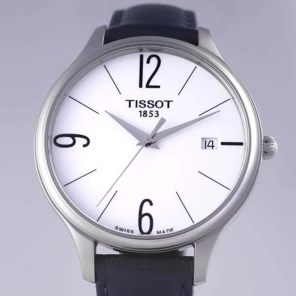 Le Locle, Швейцарія 15.01.2020 - Tissot man watch less steel case, white clock face dial, ather strap, swiss quartz techantic watch isolated, swiss made production — стокове фото