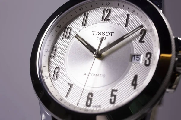 Le Locle, Швейцарія 15.01.2020 - Tissot man watch less steel case, white clock face dial, ather strap, swiss quartz techantic watch isolated, swiss made production — стокове фото