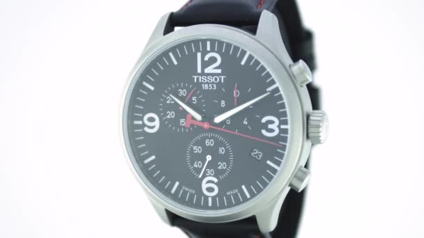 Le Locle, Switzerland 15.01.2020 - Tissot man watch stainless steel case, leather strap, swiss quartz Machine watch isolated, swiss made maneuting stand up — 비디오