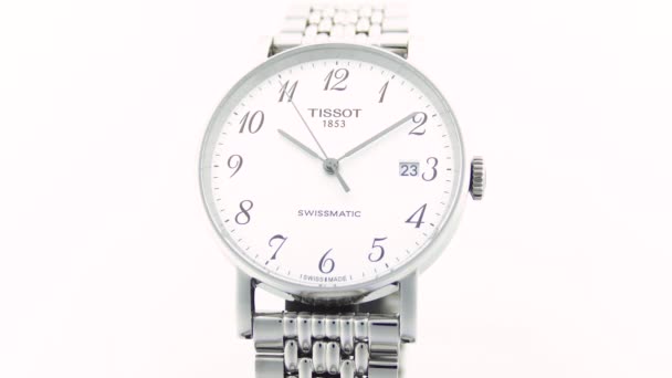 Le Locle, Switzerland 15.01.2020 - Tissot woman watch stainless steel case, white clock face dial, metal bracelet, swiss quartz mechanical watch isolated, swiss made manufacture — Stock Video