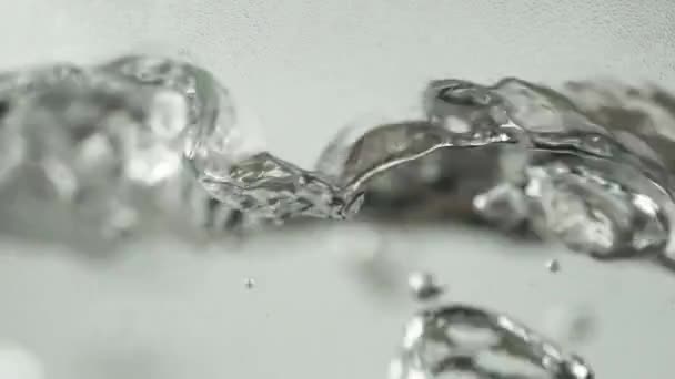 Electric kettle with transparent walls. Active boiling water. Close-up. Bubbles — Stock Video