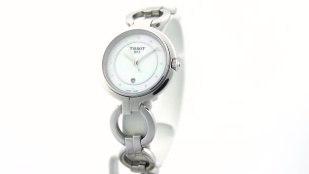 Le Locle, Switzerland 15.01.2020 - Tissot woman watch stainless steel case, white clock face dial, metal bracelet, swiss quartz mechanical watch isolated, swiss made manufacture — Stock Video