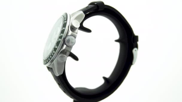 瑞士勒罗克，2020年1月15日- Tissot man watch stainless steel case, black clock face dial, leather strap, swiss quartz mechanical watch isolated, swiss made manufacture rotating stand — 图库视频影像