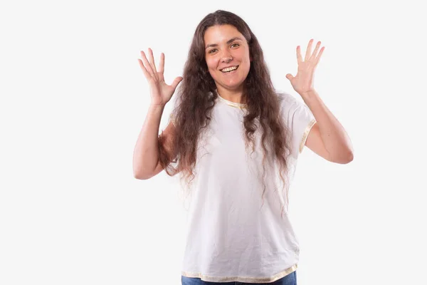 Girl broadly smiles. Hands in surprise pose. Pleasant suddenness concept — Stock Photo, Image