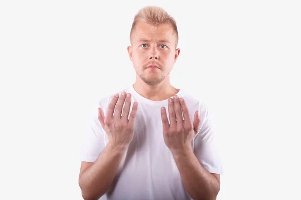 Uomo caucasico che mostra il lato opposto dei palmi delle mani. Isolato su sfondo bianco — Foto Stock
