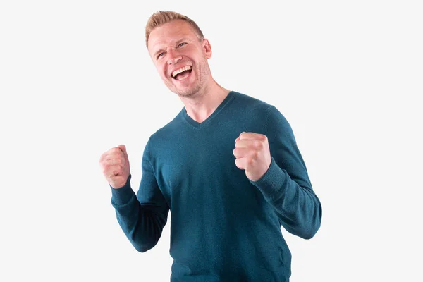 Attractive middle age man laughing joyfully, hands raised. Fan win concept — Stock Photo, Image