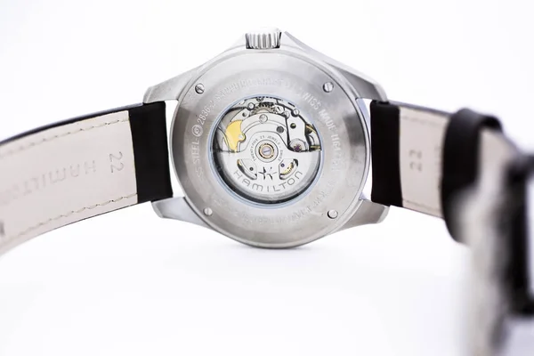 Biel, Switzerland 31.03.2020 - The close of Hamilton man watch stainless steel case back case leather strap swiss quartz Machine watch isolated lying on table swiss made manufactory — 스톡 사진