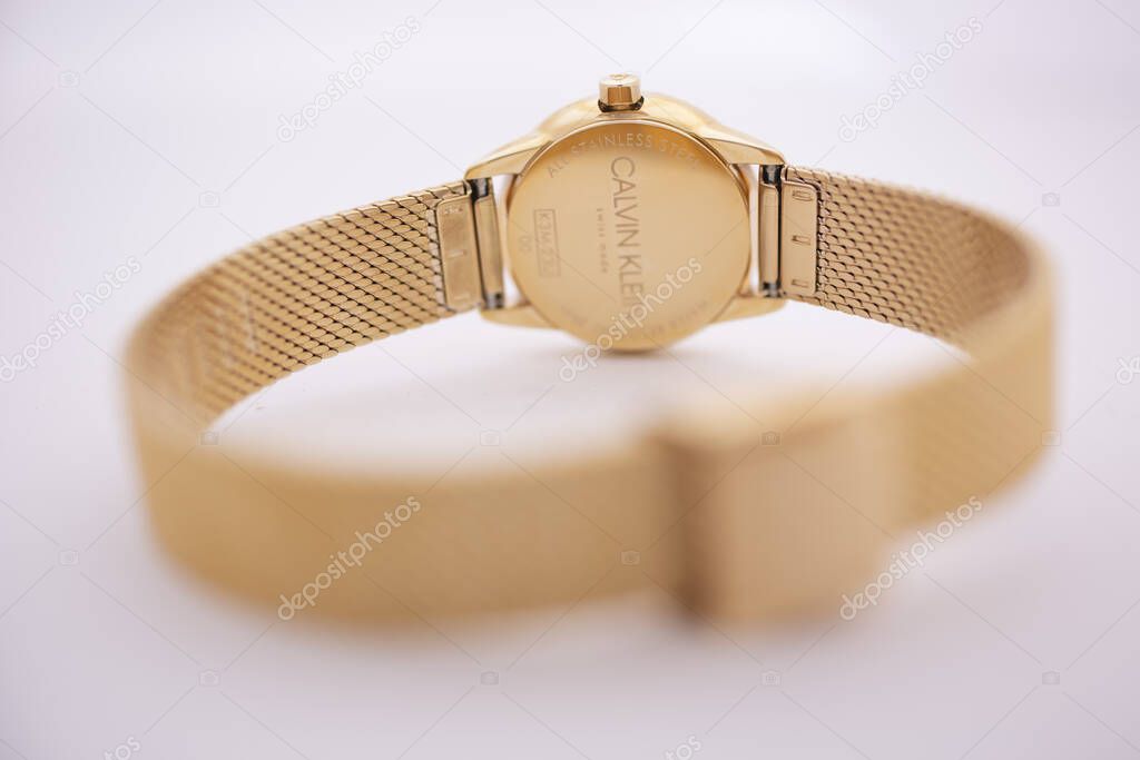 Biel, Switzerland 31.03.2020 - The closeup of CALVIN KLEIN woman watch stainless steel case gold PVD coating stainless steel bracelet swiss quartz watch swiss made manufacture isolated .