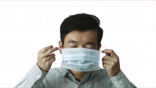 Chinese mit Maske gegen 2019-nCov. Pandemie. Virenschutz — Stockvideo