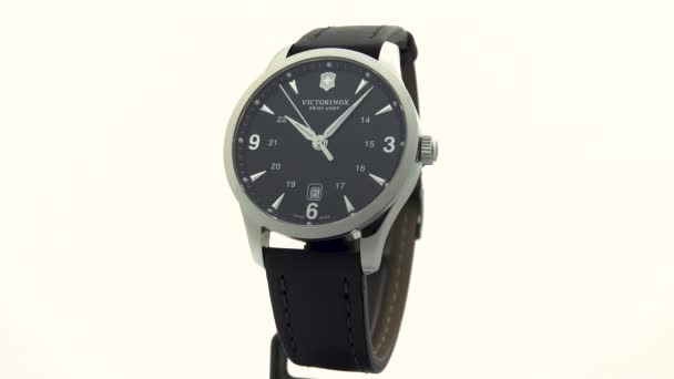 스위스 , Ibach 2020 - Victorinox Man watch stainless steel case black clock face locked on white background — 비디오