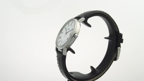 Saint-Imier, Szwajcaria, 2.02.2020 - Longines watch white clock face dial Rotating on stand leather strap — Wideo stockowe