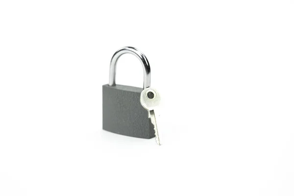 Locked padlock and key - symbol of security, personal data protection — Stock Photo, Image