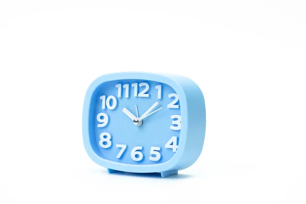 Blue plastic alarm clock time: 10.05 close up isolated on white background — Stock Photo, Image