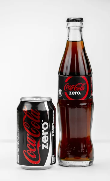 Atlanta, Georgia, USA April 1, 2020: Coca-Cola zero contour bottle and Coca-Cola zero classic black aluminum can 330 ml isolated on white background. — Stock Photo, Image
