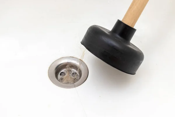 How to Stop Hair Going Down the Shower Drain - Royalty Plumbing