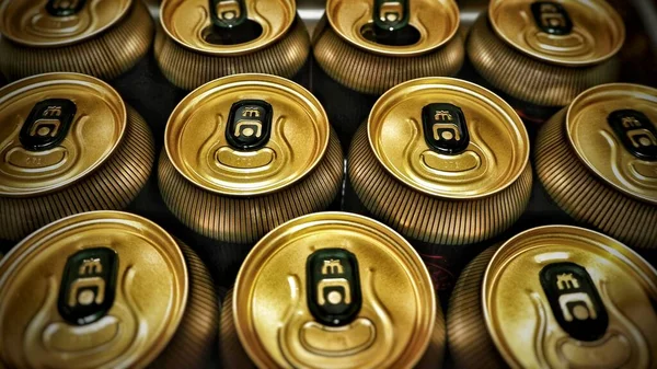 Background of cans of beer in a row.