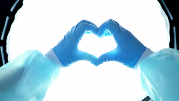 Las Manos Médico Con Guantes Azules Hacen Que Corazón Fondo — Vídeos de Stock