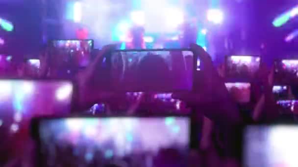 Crowd Watches Concert Sings Jumps Strobing Stage Lights Happy People — Stock Video