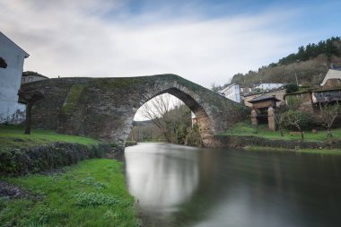 Roman Bridge in Navia de Suarna clipart