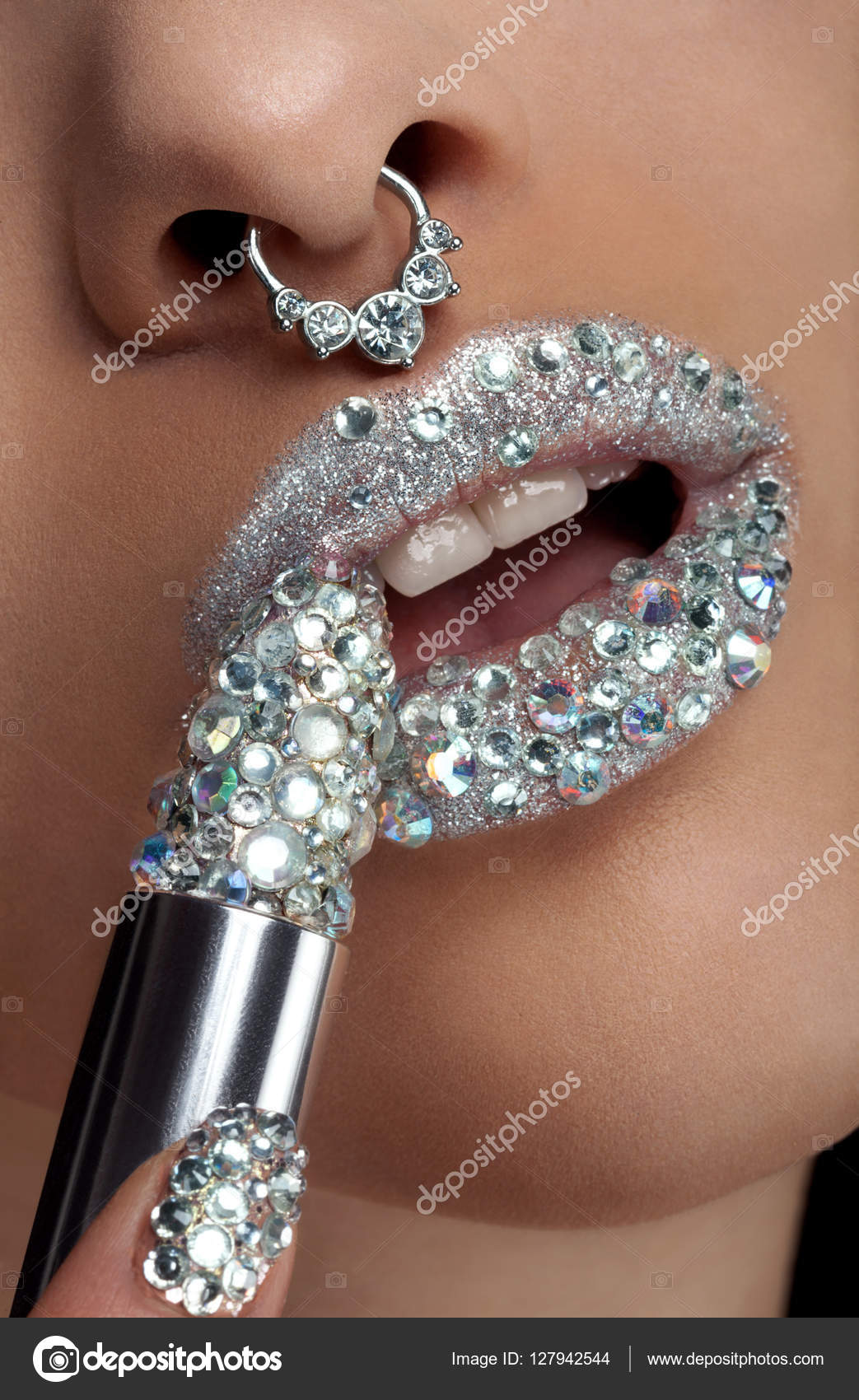 Diamond lips with lipstick in gem in close up photo Stock Photo by  ©DragosCondreaW 127942544