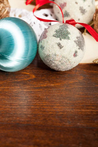 Christmas balls decorations on wooden table — Stock Photo, Image