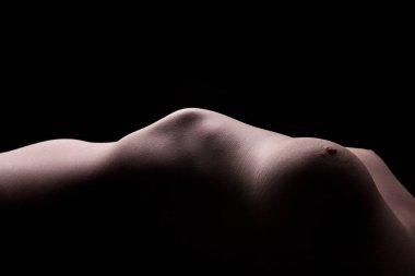 Sanatsal gölgeler siyah arka plan üzerine sıcak kadın vücudunda