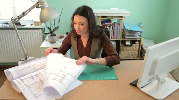 Architect woman working on a new project in her office — Stock Video