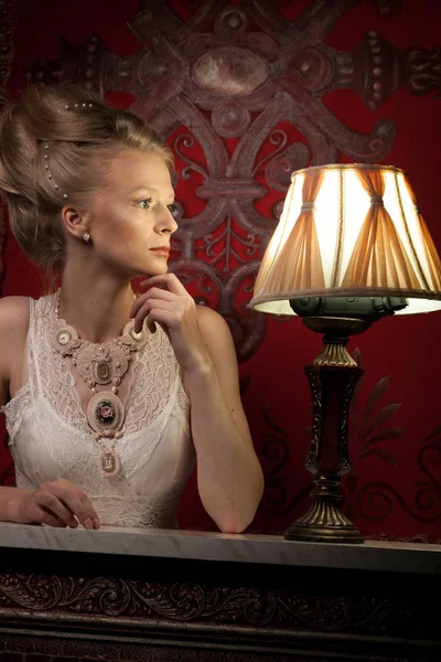 Woman in victorian dress and interior — Stock Photo, Image