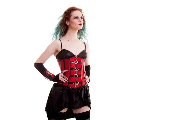 Beau modèle BDSM en corset de cuir sur fond blanc — Photo
