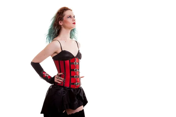 Modèle Slim BDSM en corset de cuir sur fond blanc — Photo