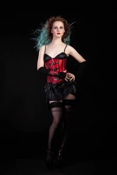 Femme sexy en corset de cuir rouge — Photo