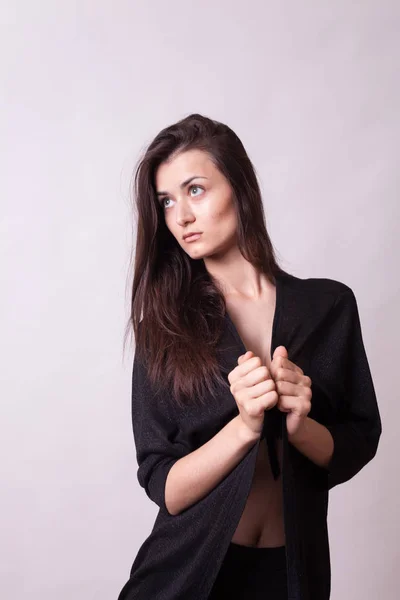 Portrait of gorgeous woman posing in studio