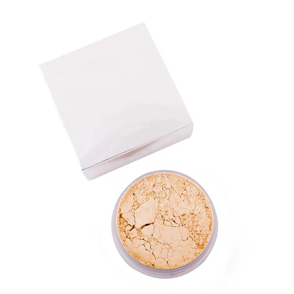 Cosmetic powder next to a box — Stock Photo, Image