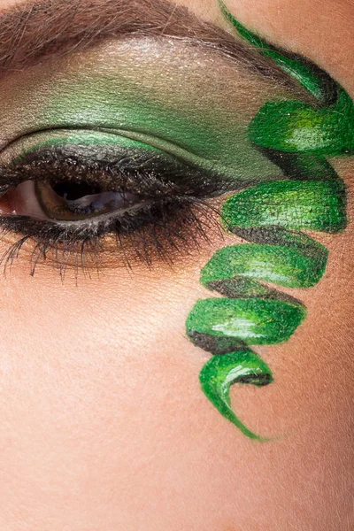 Close up of an eye with artistic make up — Stock Photo, Image
