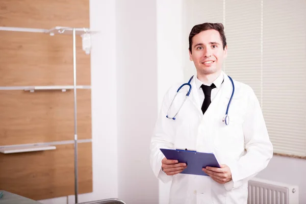 Young Doctor with stethoscope arround his neck in hospital recov — Stock Photo, Image