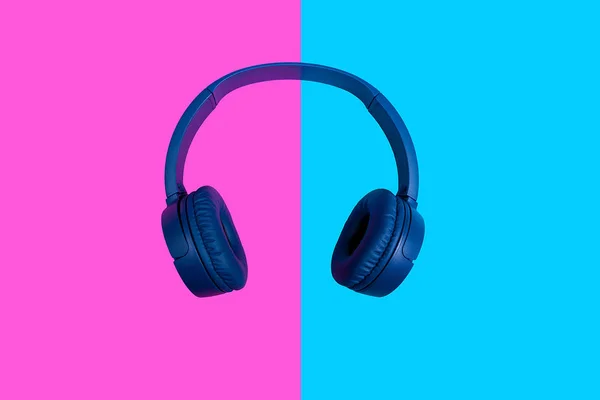 Top view on wireless headphones on vivid color background — Stock Photo, Image