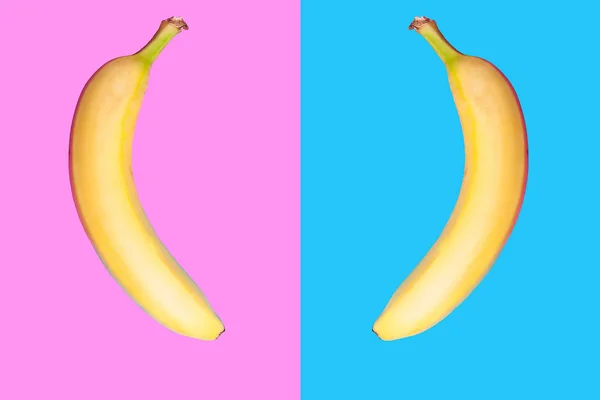 Two bananas facing eatch other on two colroed background — Stock Photo, Image