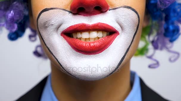 Close up of unrecognisable clown smiling large to the camera — Stock Video