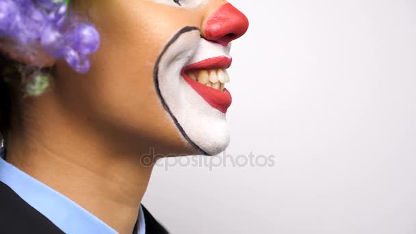 Close up of unrecognisable clown smiling large to the camera — Stock Video