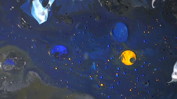 Cena espacial abstrata de diferentes gotas de tinta — Vídeo de Stock