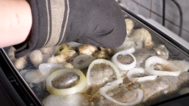 Cook hand with a glove on taking the lid of — Stock Video