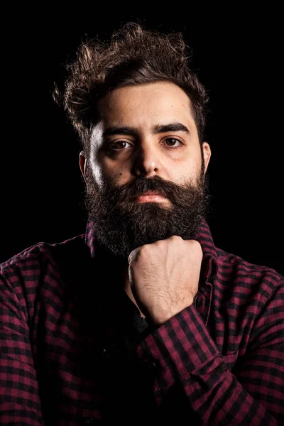 Portrait of bearded man on black background — Stock Photo, Image