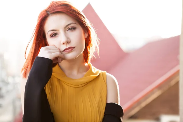 Outdoor portrait of beautiful redhead woman — Stock Photo, Image
